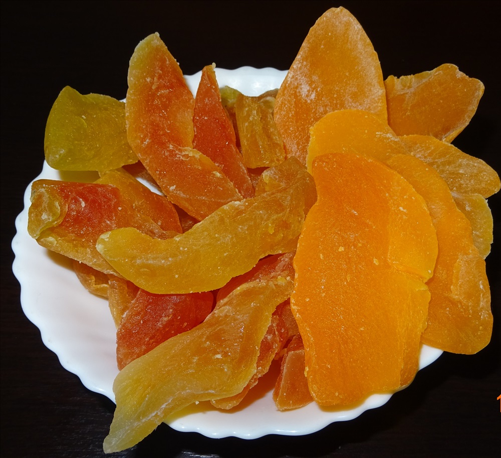 Экзотические сухофрукты. Сушеные экзотические фрукты. Сушеные сладкие фрукты. Оранжевый сушеный фрукт.